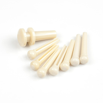 Kołki mostka kremowe do gitary akustycznej + 1 zaczep paska D'Addario